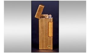 Dunhill Lighter Gold Plated Rectangular Reeded Form, Numbered 31447. Complete in Fitted case with