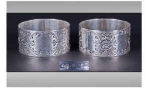 Victorian Pair Of Silver Napkin Rings. With engraved decoration. Unused condition. Hallmark