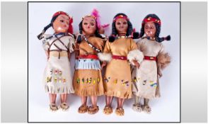 Four Small Indian Sioux Toy Figures.