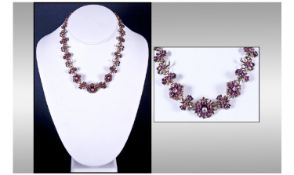 Continental Silver Fringe Necklace. With Stylised Floral Links, Set With Ruby Coloured Stones.