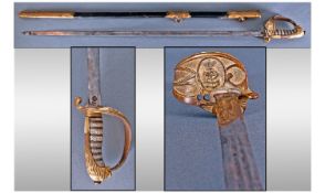 Victorian Naval Officers Sword With etched steel blade, brass hilt with wire bound fish skin grip