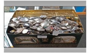 Tin Containing A Large Quantity Of World Souvenir Spoons. Looks to Be Mostly Silver Plated. Some