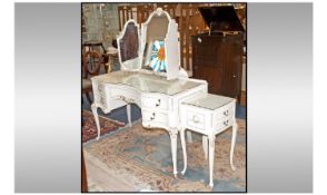 A 1960`s Olympus Triple Mirrored Dressing Table. Painted white with Gilded Highlights in the Queen