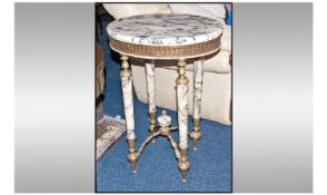 French Style, Elegant, Antique Style Ormolu Mounted Salon Table with oval marble top on round legs.