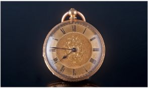 18ct Gold Ornate And Chased Open Faced Pocket Watch, with a gold dial. The centre with chased