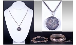 A Small Collection Of Silver Jewellery.  1) Silver Bangle 24.8 grams. 2) Silver Locket and Chain.