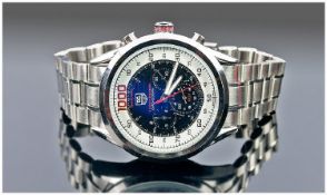 A Modern Replica Tag/Heuer Mikrotimer 1/1000th Precision Chronograph Gents Wristwatch on a heavy