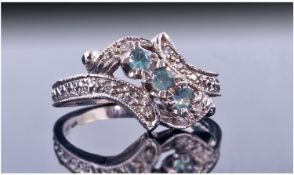 14ct White Gold Dress Ring. Set with 3 Round Emeralds Surrounded By Small Round Cut Diamonds. Fully