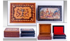 Russian Signed Lacquered Trinket Box. Together with an inlaid wood trinket box. 2 boxes in total.