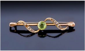 9ct Gold Bar Brooch. Set With Central Peridot Coloured Stone and Seed Pearls. Stamped 9ct. Length