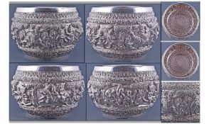 A Large And Impressive Indian Cast Silvered Metal Bowl. The finely hollow cast embossed body boldly