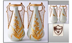 Granger Worcester Hand Painted Pair Of Two Handled Reticulated Tapered Vases. Decorated with raised