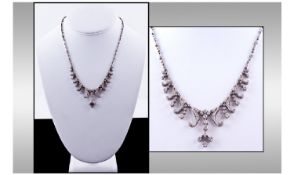 Diamond Set Fringe Necklace. Of Floral Scroll Design Set With Round Brilliant Cut Diamonds in White