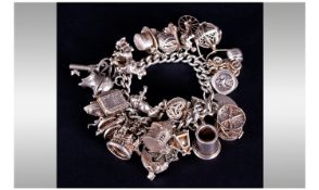 Vintage Silver Charm Bracelet Loaded with 28 Charms. All Marked Silver. 5ozs.