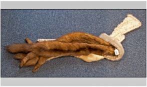 Three Mink Stoles together with a full fox with head and tails.