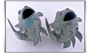 A Pair Of Oriental Bronze Carp Figures, with open mouths. Could be used as fountain heads. With a