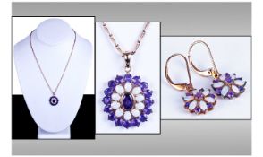 9ct Gold Pendant Set With A Central Amethyst, Surrounded by 10 Milk Opals. And a Further Band Of