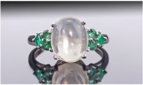 Green Moonstone and Emerald Ring, central oval 3ct cabochon cut pale green moonstone from India,