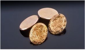 Pair Of Early 20th Century 9ct Gold Cufflinks. Of Oval Form with Chain Fittings. The Fronts with