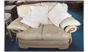 Cream Beige Two Seater Settee with Scatter Cushions.
