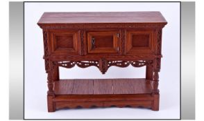 A Miniature Flemish/Flanders Dresser Base. Finely carved in the Gothic manner. On carved legs with