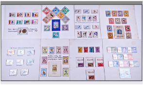 Twelve Large Well Presented Stamp Cards covering the Olympics from 1960 to 1976 features stamps
