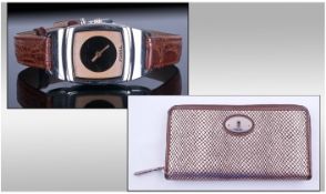 Fossil 54 Radio Ladies Polished Steel Cased Wrist Watch. Fitted on Tan Leather Strap with box and