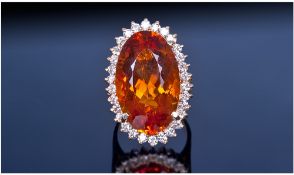 14ct Gold Diamond & Citrine Ring, Set With A Large Oval Cut Orange Citrine, (Estimated Weight 17.