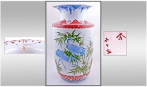 A Large Japanese Arita Style Vase, decorated in underglazed blue with crane birds with Imari