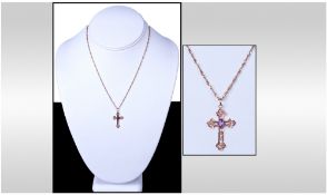 Small 9ct Gold Pendant Cross, Set With An Amethyst Suspended On A Fine Link Chain.