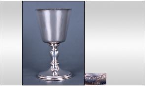 A. E. Jones. A Fine Silver Goblet on a Knopped Stem and Spreading Foot with Silver Gilt Interior.