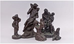 Five Bronzed Resin Figures. Comprising; 1, lovers seated on rocks, height 12.5 inches. 2, male