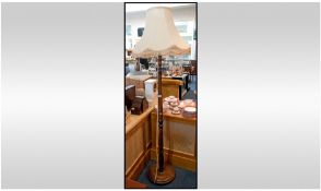 Turned Stained Beech Standard Lamp With Shade. Height 60 Inches.