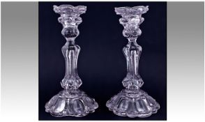 Pair Of Victorian Pressed Glass Candlesticks, on petal shaped bases and baluster stem. Height 10