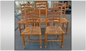 Set Of Five Wavy Ladderback Chairs in bleached ash with rush seats and traditional padded foot legs,