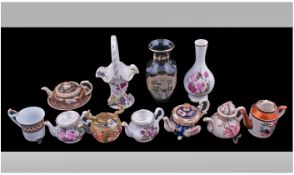 Collection of Miniature Teapots (8) together with various other vases.