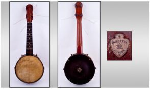 Dulcetta London Banjo, 22 inches in length. Makers mark to base. (strings missing).