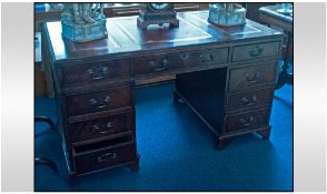 Stained Mahogany Leather Topped Kneehole Desk. Central Cupboard Between Two Sets Of Four Drawers,