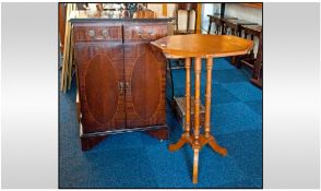 Small Beech Tilt Top Table with octagonal top, raised on three turned supports, with quatrefoil