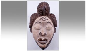 African Punu Mask. White face. Height 13 inches.