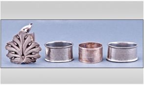 Four Silver Plated Napkin Rings.