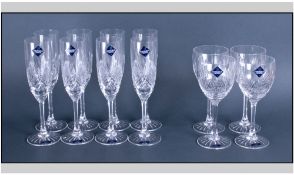 Three Boxes Of Edinburgh Crystal Drinking Sets. Comprising two boxes of four flute champagne