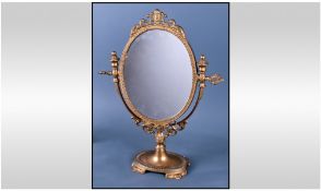 Small Brass Gothic Style Table Top Mirror, 15 inches in height.