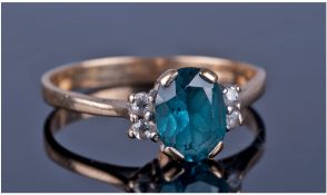 9ct Gold Diamond And Sapphire Cluster Ring, Central Green/Blue Oval Sapphire Set Between Four