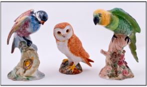 Beswick Bird Figures, 3 In Total. 1, Parakeet, model number 930, issued 1941-1975, height 6