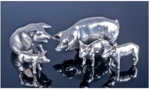 Silver Plated Family of Pig Figures (5) in total.