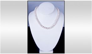 A White Cultured Akoya Pearl Necklace, 17 Inches In Length,