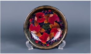 William Moorcroft Shallow Bowl ' Pomegranate and Berries ' Design. .c.1920's Diameter 7.5 Inches.