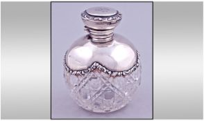 Victorian Fine Overlaid Silver Collared And Hinged Topped Cut Glass Ball Shaped Perfume Bottle.