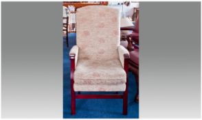 Contemporary Armchair, made by J Wedsters, the frame in a mahogany finish, upholstered in a floral